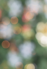 Obraz premium Blurred Bokeh abstract texture. Colorful circles shine bright light, Christmas night and background. 