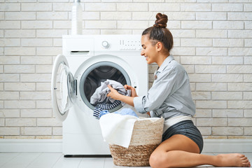 woman is doing laundry