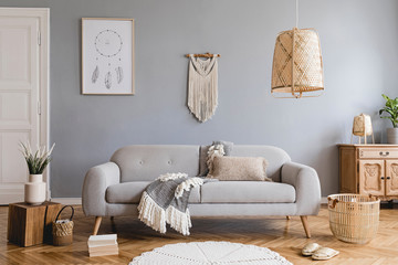 Boho interior design of living room with sofa and macrame - obrazy, fototapety, plakaty