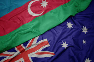 waving colorful flag of australia and national flag of azerbaijan.