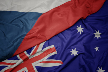 waving colorful flag of australia and national flag of czech republic.