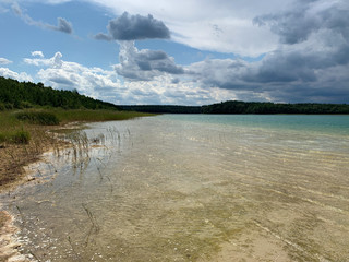 Ufer flach Strand klares Wasser türkis warm