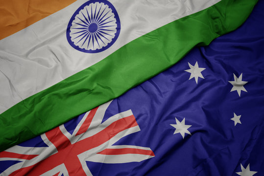 Waving Colorful Flag Of Australia And National Flag Of India.