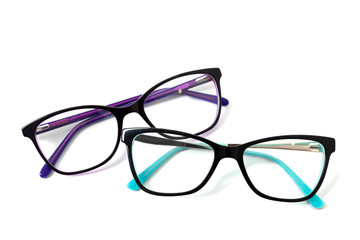 Two pairs of plastic fashionable eyeglass frames. Isolated