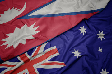 waving colorful flag of australia and national flag of nepal.