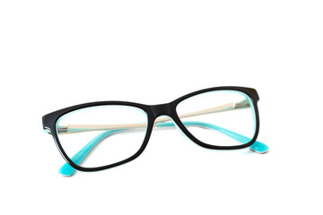 Black plastic eyeglass frame with turquoise accents. Isolated