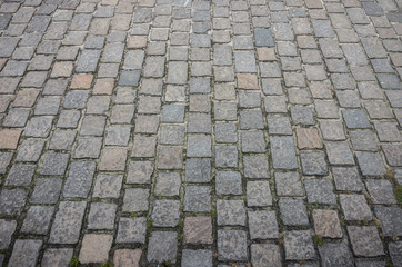 Old road paved with granite stones