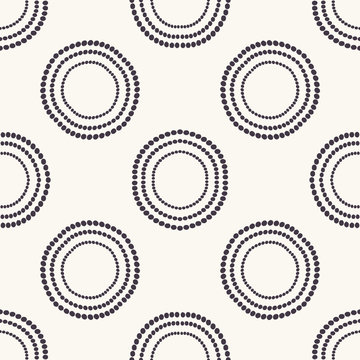 Seamless pattern. Hand drawn polka dot background. Monochrome dotty black and white concentric circle. All over print vector swatch