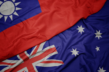 waving colorful flag of australia and national flag of taiwan.
