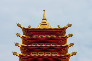 Elista, Kalmykia / Russia - 24 april 2019. The roof of the buddhist Pagoda of Seven Days. Classical buddhist architecture style with elephants heads on the corners