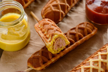 Mouthwatering corn dogs with sauces