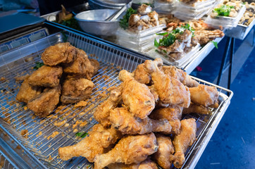 taiwanese fried chicken on a plate in the street