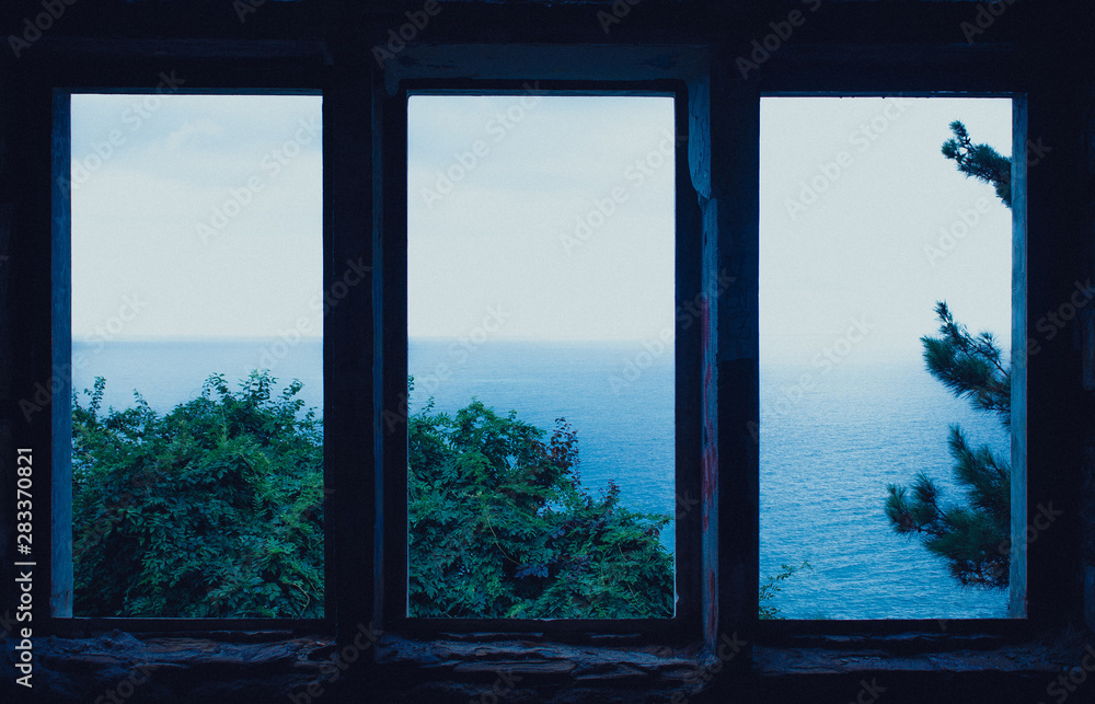 Wall mural window old ruined building sea