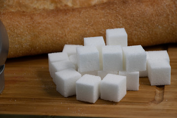 assorted items to be used in moderation on a wooden cutting board. Calgary, Alberta, Canada