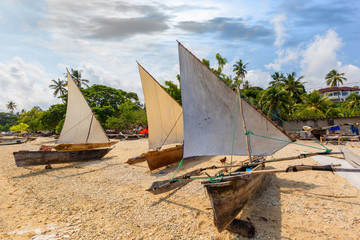fishing dhow moored after a fishing trip ready for the evenings outing seen here with outrigger...