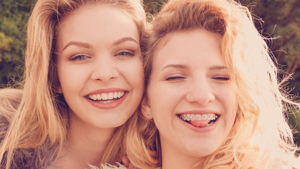 Fototapeta premium Two crazy women having fun outdoor