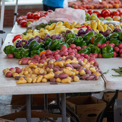 fresh fruits and vegetables displayed at the farmers maket