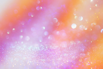 background of glitter vintage lights . silver, gold, pink and white. de-focused