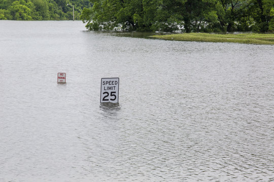 Flooded Road Signs Under Water Turn Around Don't Drown