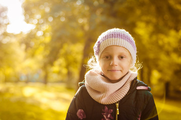 lovely girl portrait in sunny october afternoon
