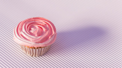 pink muffin on white background