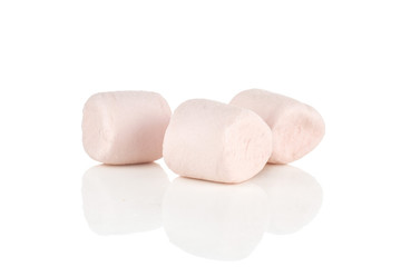 Fototapeta na wymiar Group of three whole pink sweet fluffy marshmallow isolated on white background