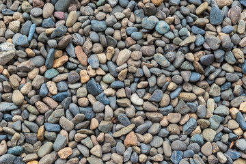 Multicolor stone pebbles ground as background