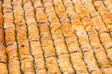 traditional arabic dessert baklava pastry with syrup and walnuts