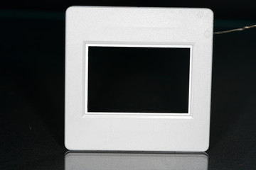 A slide frame is a small frame in the photograph, which includes the slide and thus allows the...