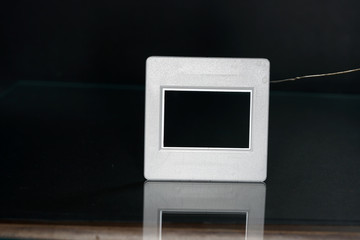 A slide frame is a small frame in the photograph