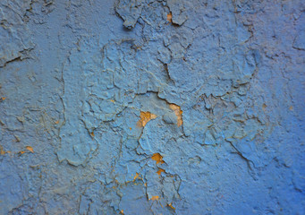 Blue textured and painted wall.