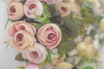 texture artificial roses on the wedding arch. decoration. background. selective focus