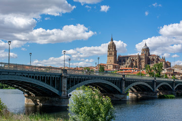 Salamanca Old and New Cathedrales reflected on Tormes River, Spain