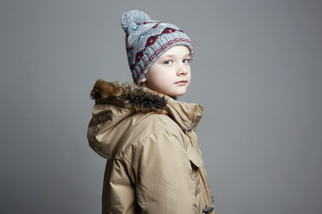 Fashionable Boy in winter outerwear. fashion kid © eugenepartyzan