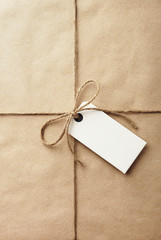parcel - brown craft paper with twine & white label