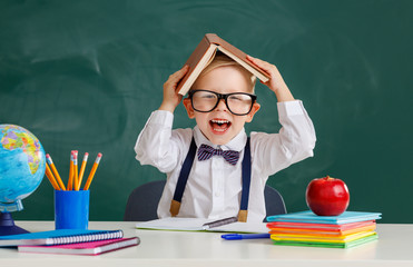 funny child   schoolboy  boy student about school blackboard