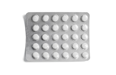 Blister pack full of white pills isolated on a white background. Full pills package. Pharmaceutical...