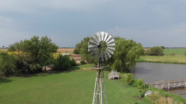 windmill spinning on a windy day