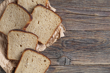 Slices of rye bread on table