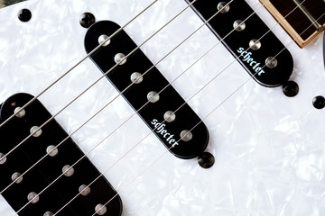 Wrocław, Poland - June 10,2019: Close up of Schecter Banshee 6- Extreme electric guitar.