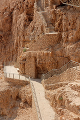 Walkway at the Masada ruins - an ancient fortress on the eastern edge of the Judean desert, Israel.