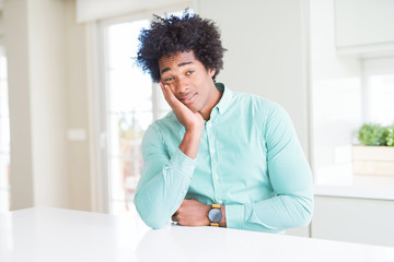 Fototapeta na wymiar African American business man wearing elegant shirt thinking looking tired and bored with depression problems with crossed arms.