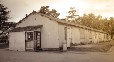 Fototapeta premium Disused and abandoned historic military buildings at CAFI Sainte-Livrade, France, serving in the past to house French repatriates from Indochina since 1956.