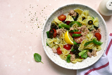 Pasta salad with tuna and vegetables. Top view with copy space.