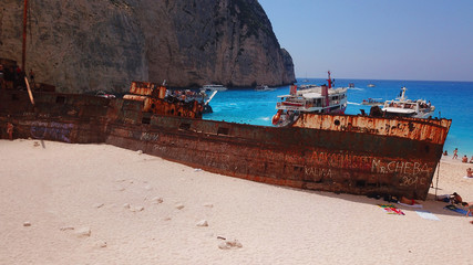 Aerial drone view of iconic beach of Navagio or Shipwreck voted one of the most beautiful beaches...