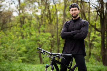 Mountain Bike cyclist riding single track in the forest