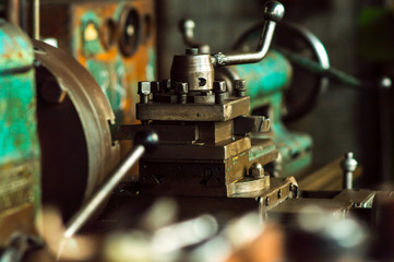 old green lathe in the workshop