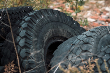 Fototapeta na wymiar recycling old car tires landfill rubber waste dump