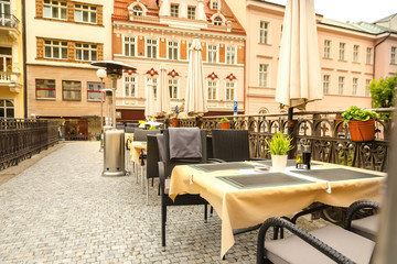 Outdoor cafe with rattan furniture, Karlovy Vary