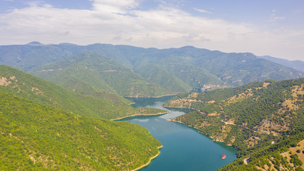 Fototapeta na wymiar Aerial view on Green hills around Vacha dam.